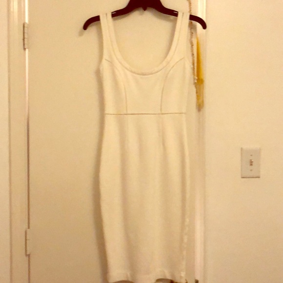 This is a tight fitted white mini dress - Picture 1 of 2